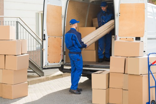 Professional man and van service assisting with a move in Ealing