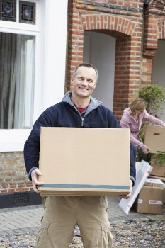 Professional removalists loading a moving truck in Ealing