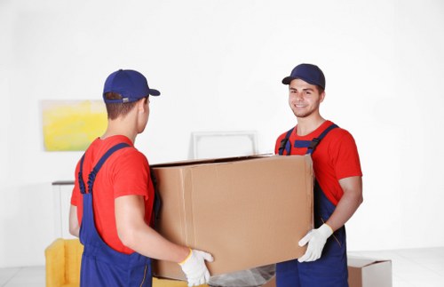 Professional movers preparing for office relocation in Storage Ealing