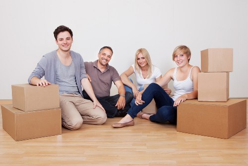 Professional movers handling household items