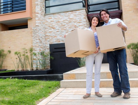 Experienced movers handling office equipment